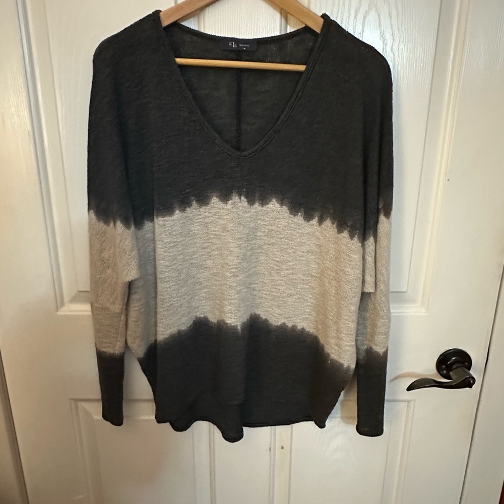 Gray and Cream V-Neck Sweater with Artistic Design